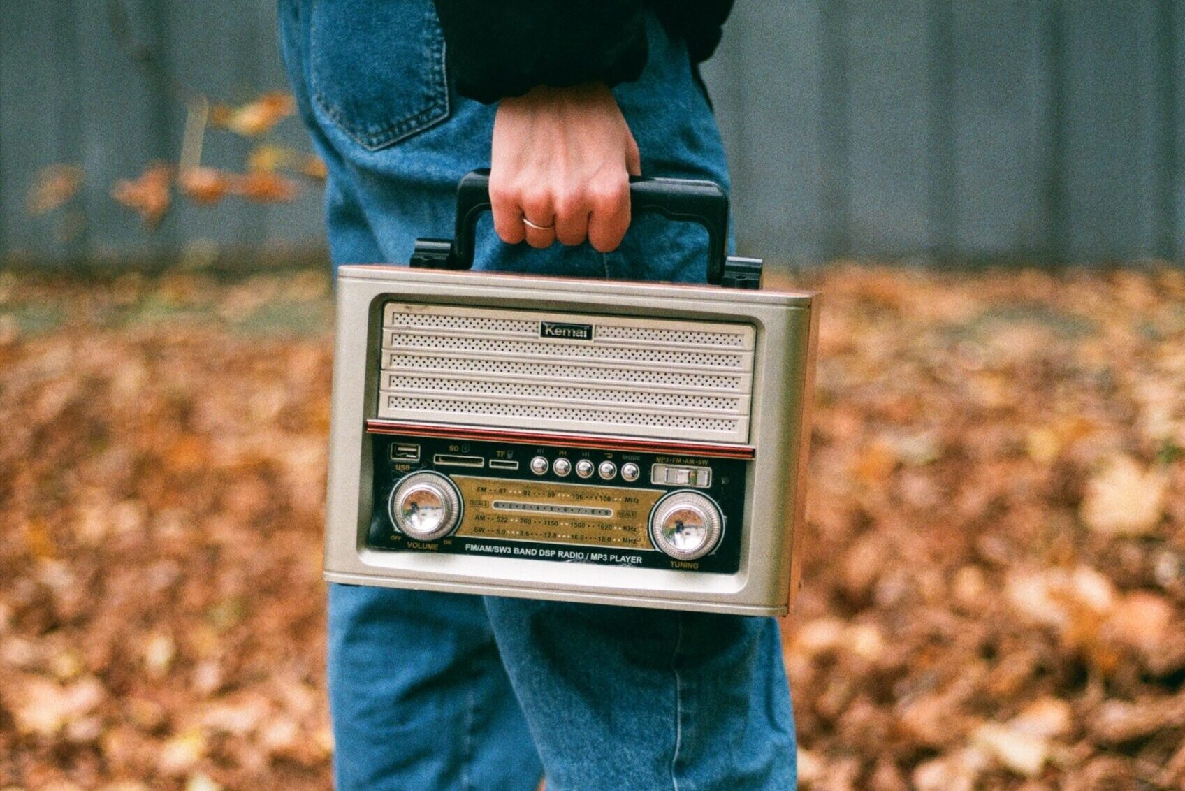 holding a radio