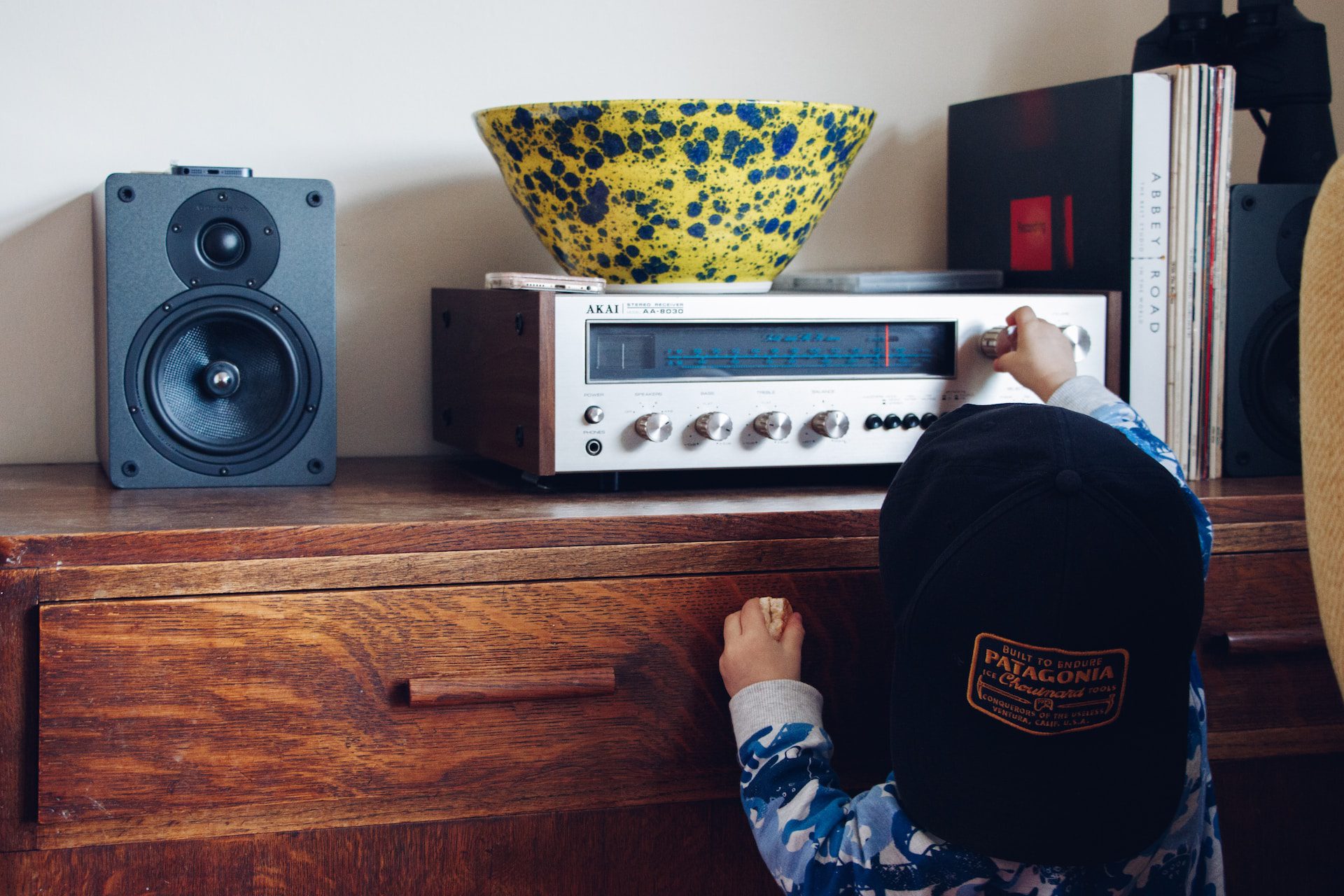 child listening to the radio